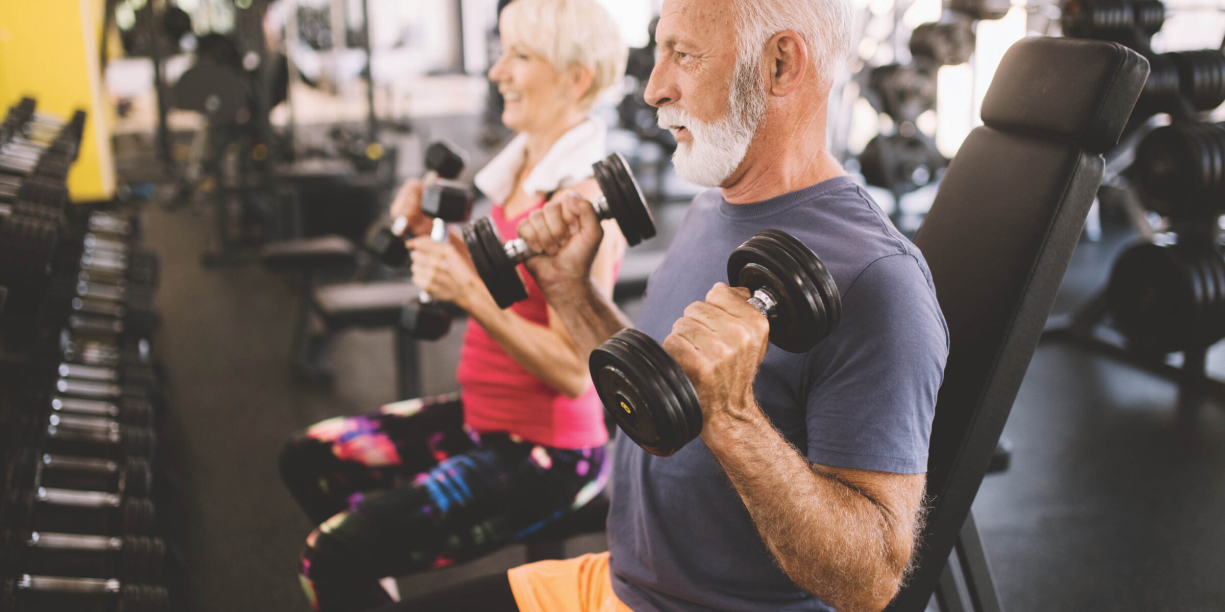 fitness center consulting people lifting weights